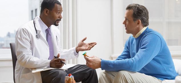 a dentist talking to patient